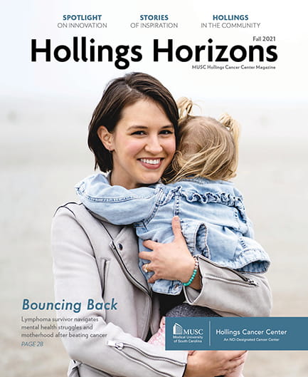cover of Hollings Horizons 2021 featuring a woman holding her child on the beach