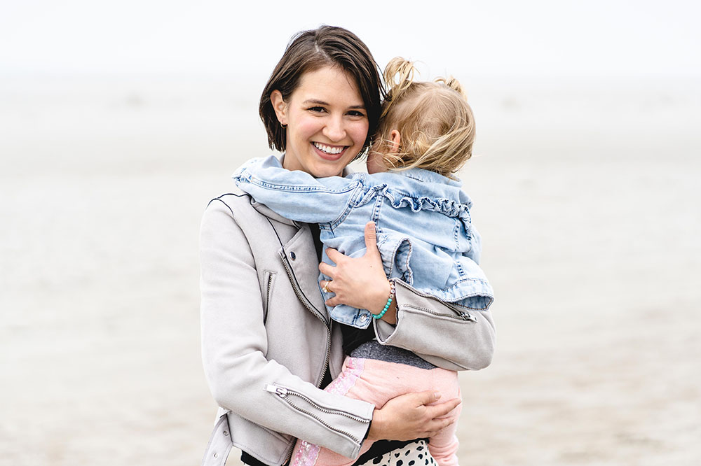 Liza Patterson holds her daughter