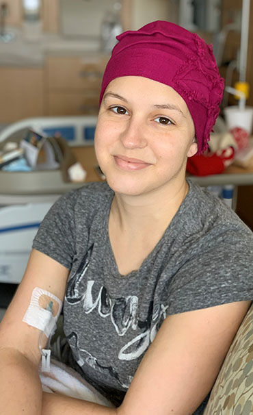 Liza Patterson sits in hospital room