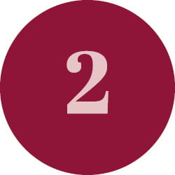 a dark red circle with the number 2 inside