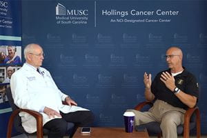 screenshot of Cross Talk Sarcoma episode showing Dr. Raymond DuBois and Charleston police chief Luther Reynolds
