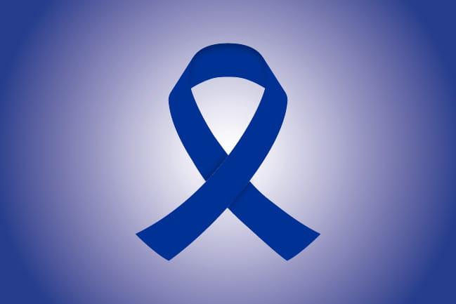 dark blue colored ribbon representing colorectal cancer