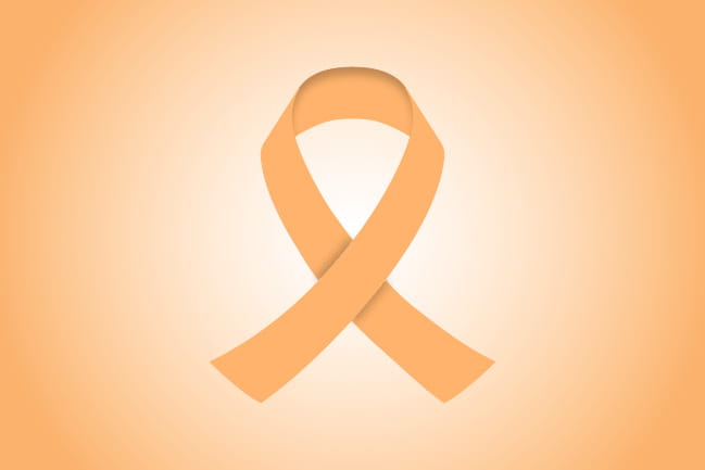 peach colored ribbon representing uterine cancer