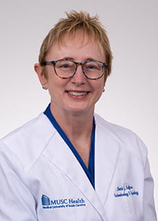 headshot of Brenda Hoffman in white coat