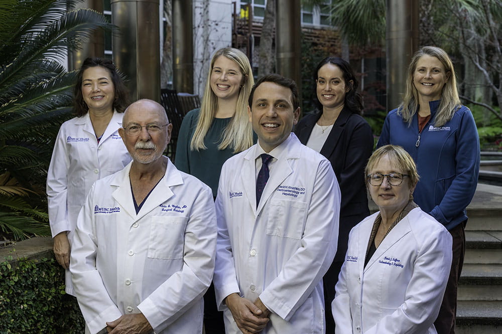 group photo of doctors, genetic counselor, dietitian, psychologist and nurse practitioner