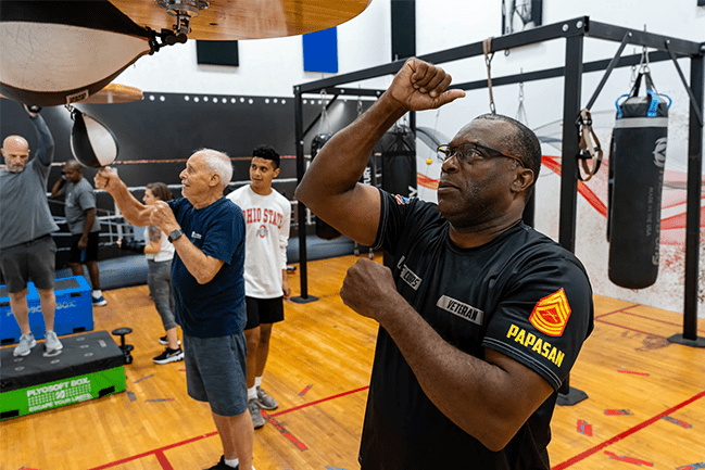 men boxing in gym