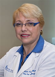 Dr. Sophie Paczesny in lab coat