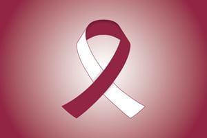 burgandy and white cancer ribbon representing head and neck cancer