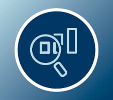 icon showing magnifying glass examining bar chart 