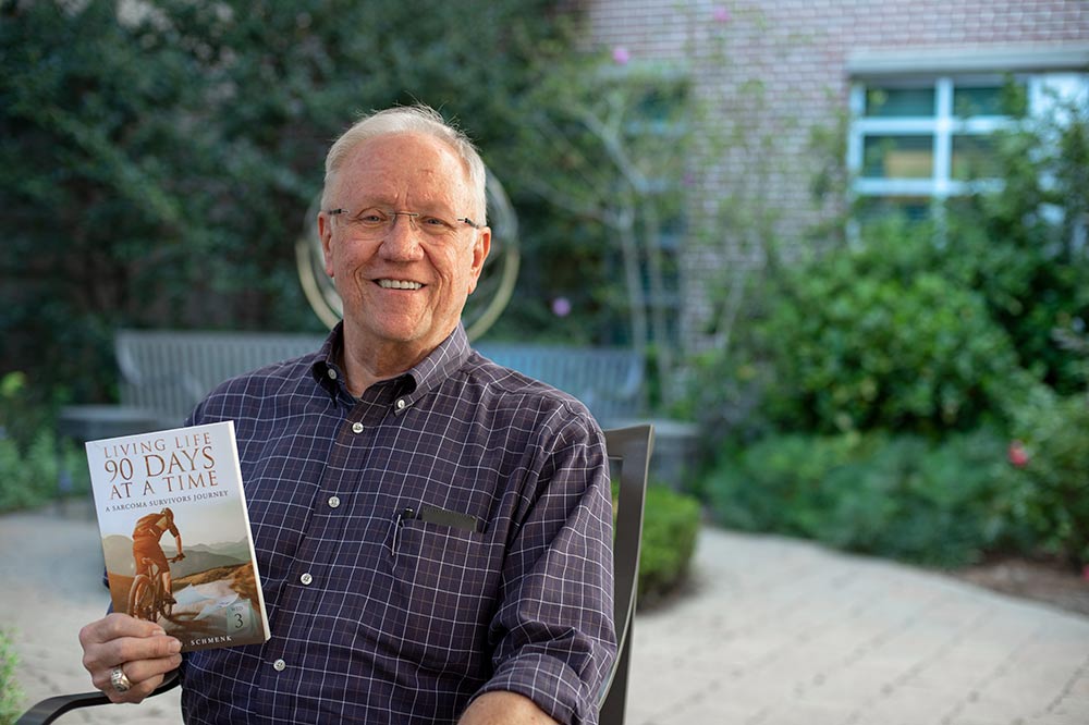 Thom Schmenk with book