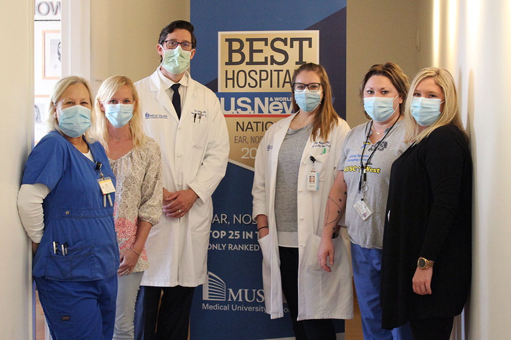 group photo of head and neck cancer care staff