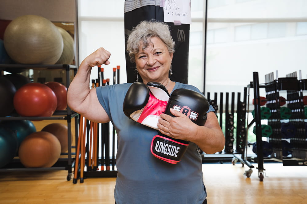 MUSC Hollings’ Survivors’ Fit Club member Joann Baldwin poses for a photo during a workout session.