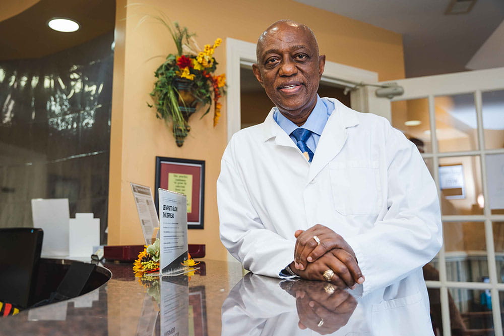 Dr. Larry Ferguson stands in the reception area of his dental practice