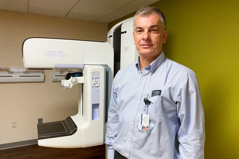 Dag Pavic with breast imaging device
