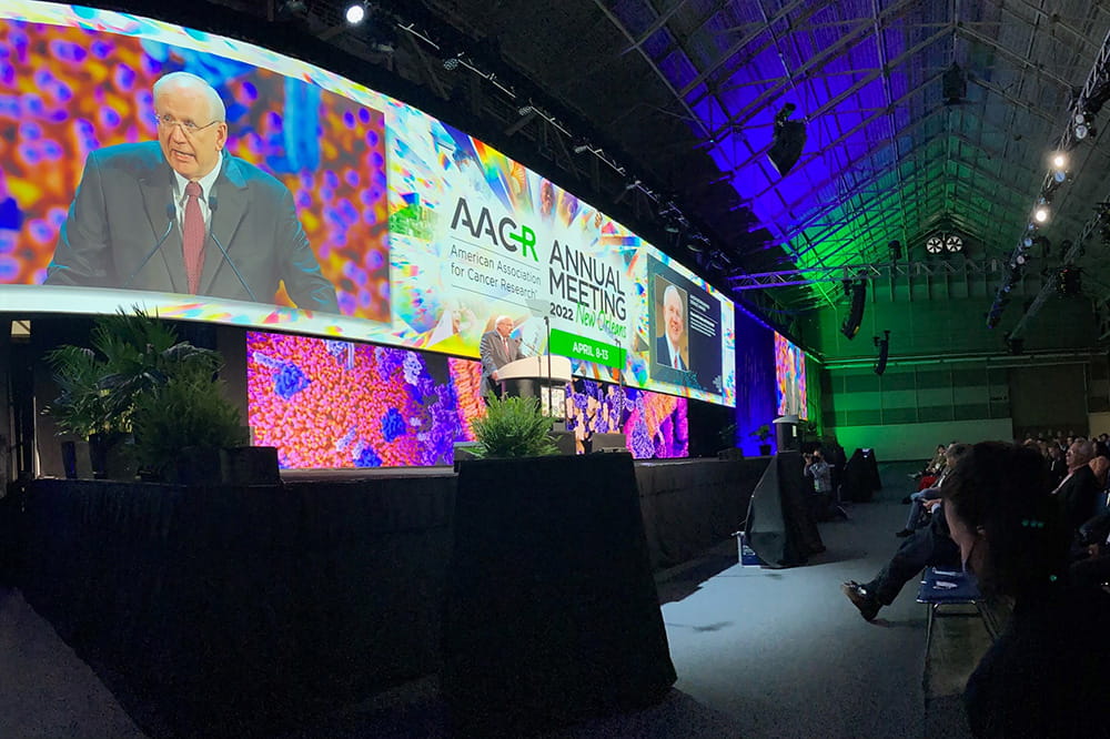 Dr. Raymond N. DuBois gives an acceptance speech onstage during the opening ceremony of the 2022 American Association of Cancer Research convention