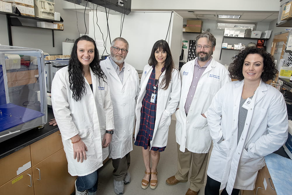 Members of the research team (left to right): Kathleen Garrabrant; Patrick Woster, Ph.D.; Ivett Pina, Ph.D.; Yuri Peterson, Ph.D.; and Catherine Mills, Ph.D. Photo by Sarah Pack.
