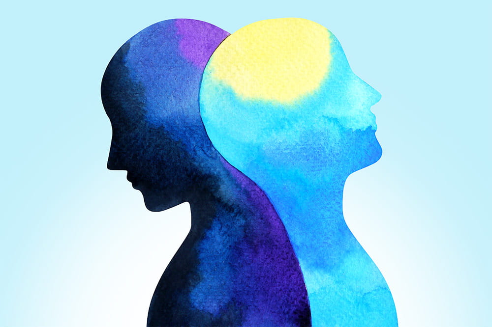 illustration of a dark blue head looking down with a superimposed light blue head looking upward