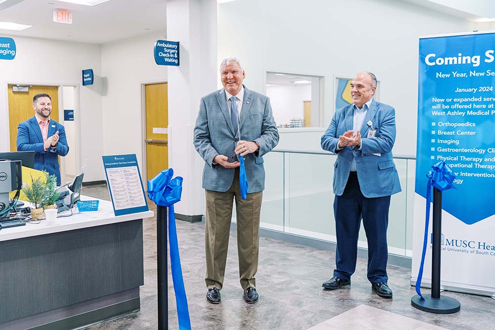 https://hollingscancercenter.musc.edu/-/sm/news-center-media/news-center-images/2023-images/12/wamp-stroupe-cole-cawley-ribbon-cutting.jpg