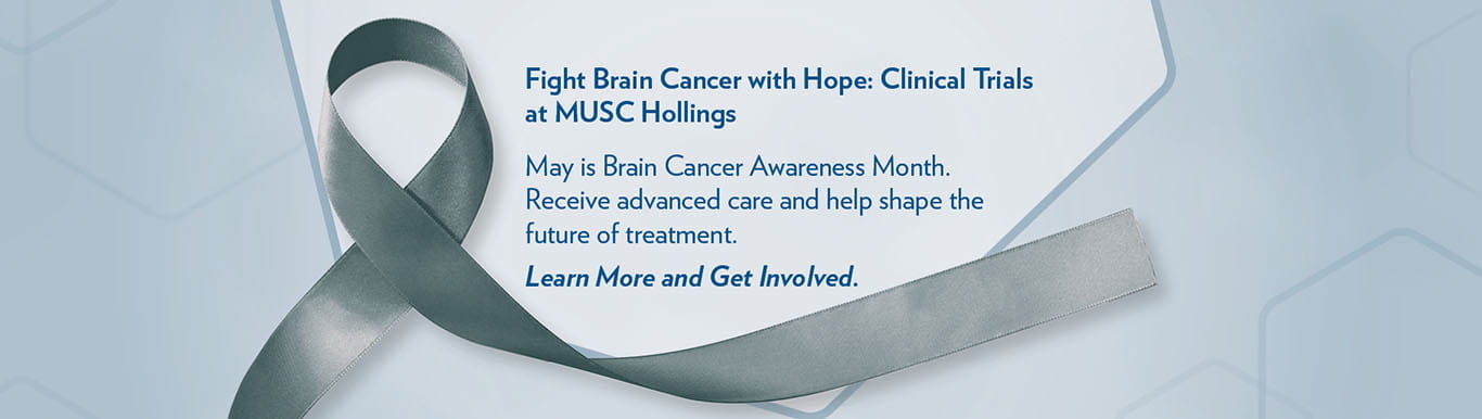 gray brain cancer awareness ribbon with text that says Fight brain cancer with hope: clinical trials at MUSC Hollings. May is Brain Cancer Awareness Month. Receive advanced care and help shape the future of treatment. Learn more and get involved